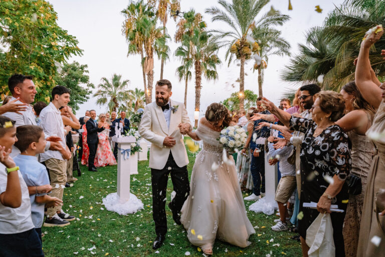 Walking back down the aisle through the guests, Casa delle Terre Forti, Aci Castello, Sicily, Pierpaolo Perri