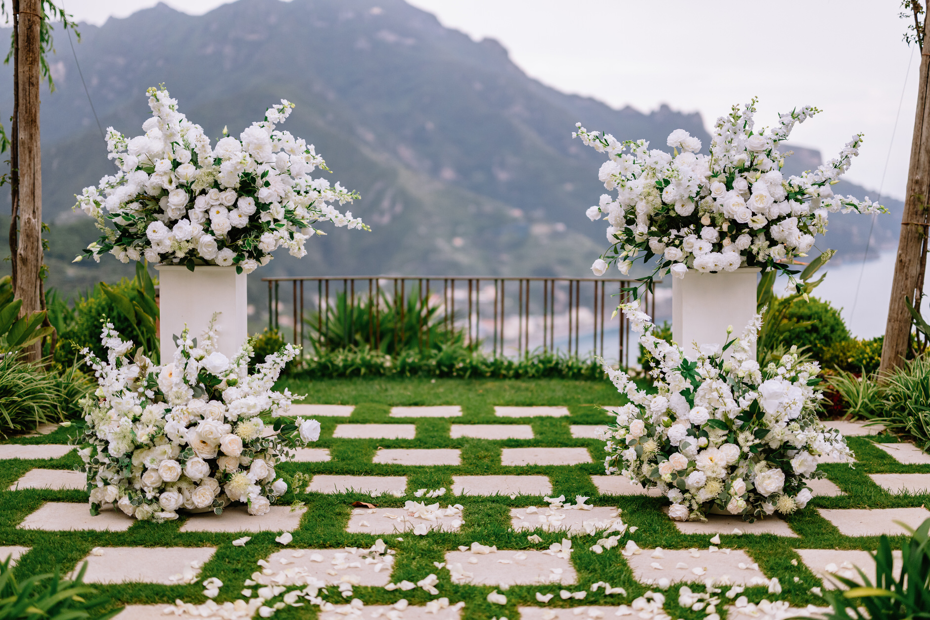 The ceremony garden laid with white flowers above the coast, Villa Eva, Ravello, Pierpaolo Perri