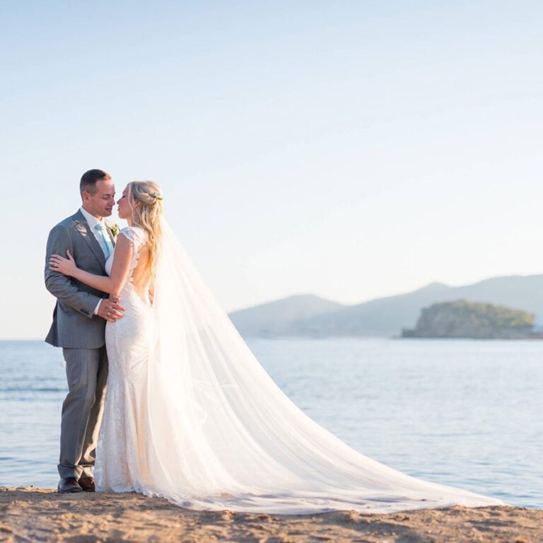 A couple on the beach at sunset, Ibiza, Pura Vida Beach Ibiza