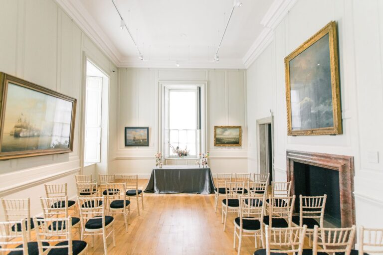 A gallery room set with chairs for an intimate ceremony, Queen's House