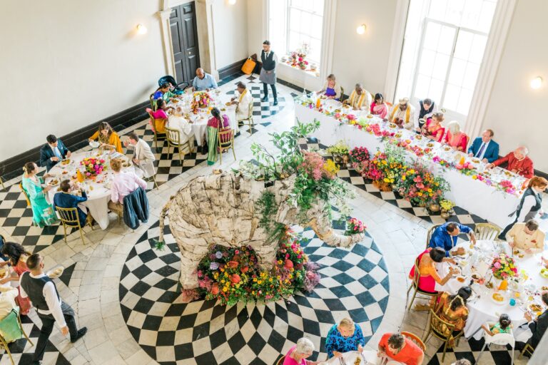 A wedding dinner in the Great Hall seen from above, Queen's House
