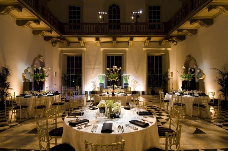 The Great Hall laid for a dinner under its balcony, Queen's House