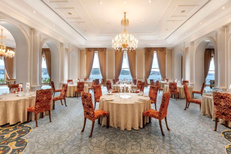 Dining hall with round tables and Bosphorus windows, Çırağan Palace Kempinski Istanbul