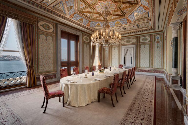 Ornate palace dining room set for a seated meal, Çırağan Palace Kempinski Istanbul
