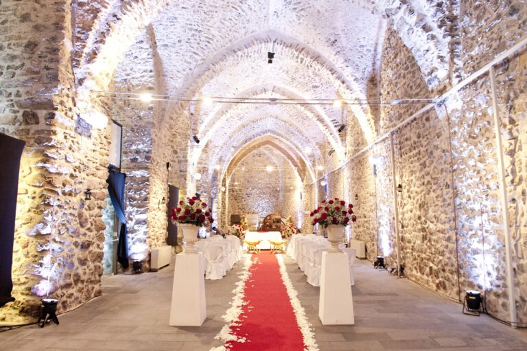 A ceremony laid the length of the vaulted stone hall of the Arsenale of Amalfi, Ramona Avitabile Wedding Planner