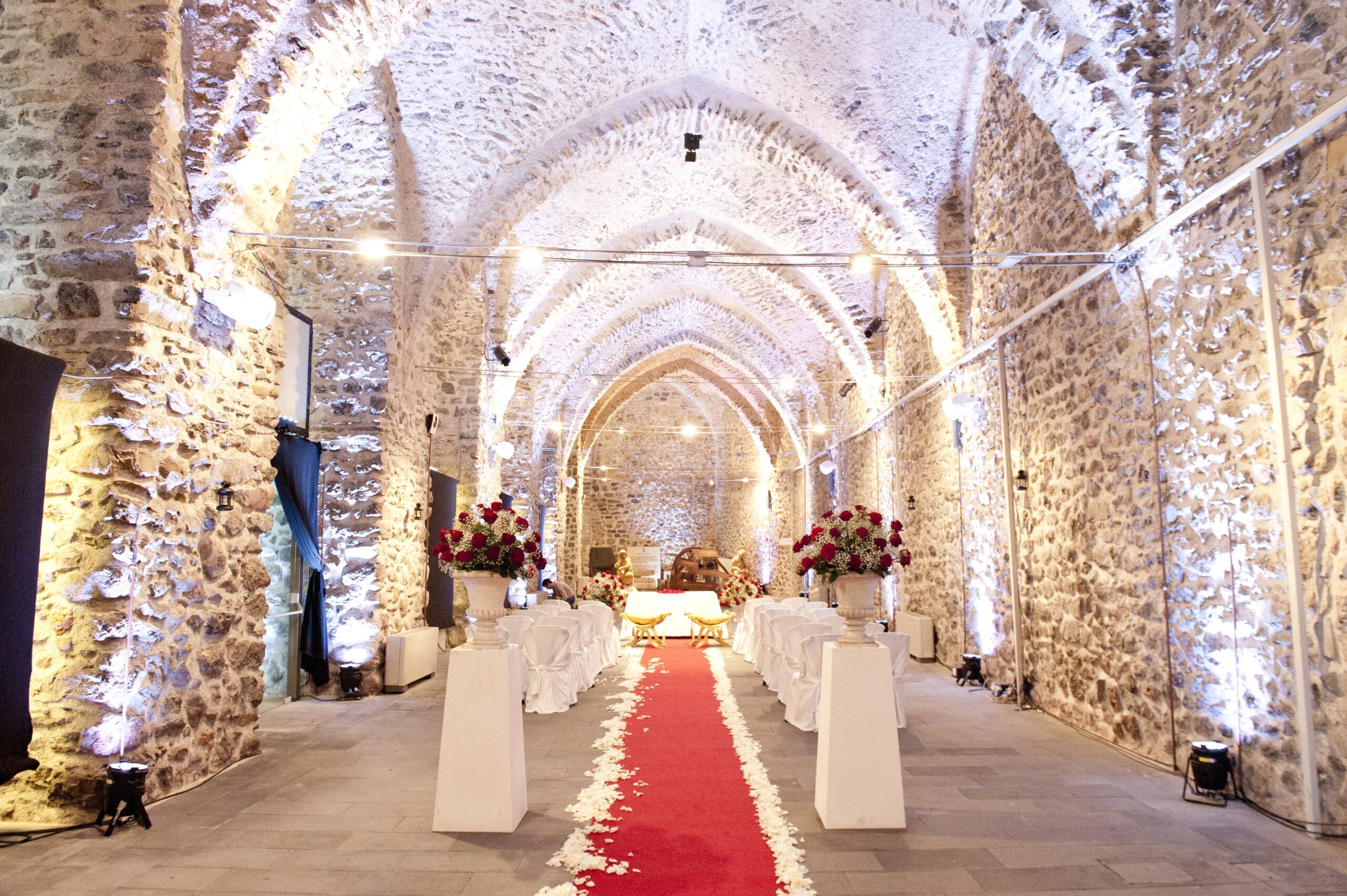 A ceremony laid the length of the vaulted stone hall of the Arsenale of Amalfi, Ramona Avitabile Wedding Planner