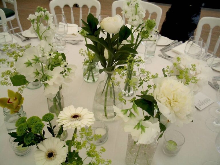 A wedding table dressed in white and green, gerbera and peony, Rebecca Mays