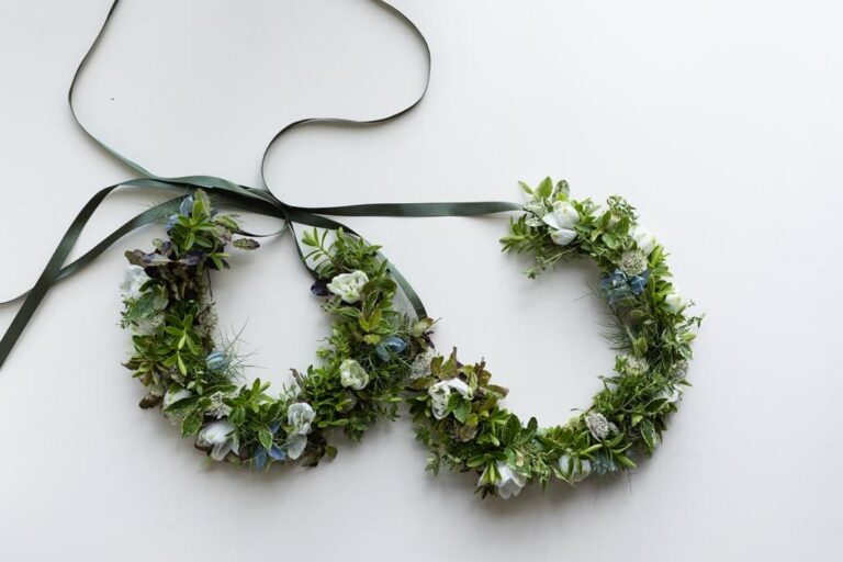 A pair of flower crowns, tied together with ribbon, Rebecca Mays