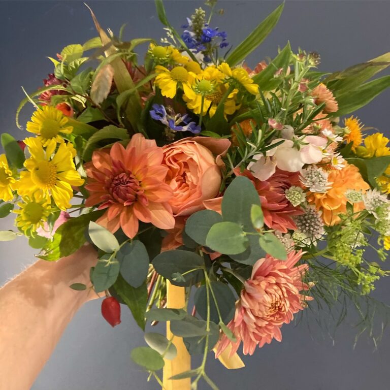 A hand-held bridal bouquet in autumn tones, dahlia and rose, Rebecca Mays