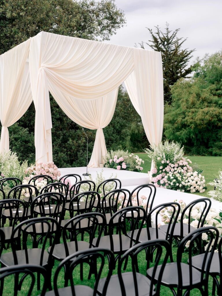 Ivory draped ceremony canopy and aisle seating, Santa Barbara, Revelry Event Designers