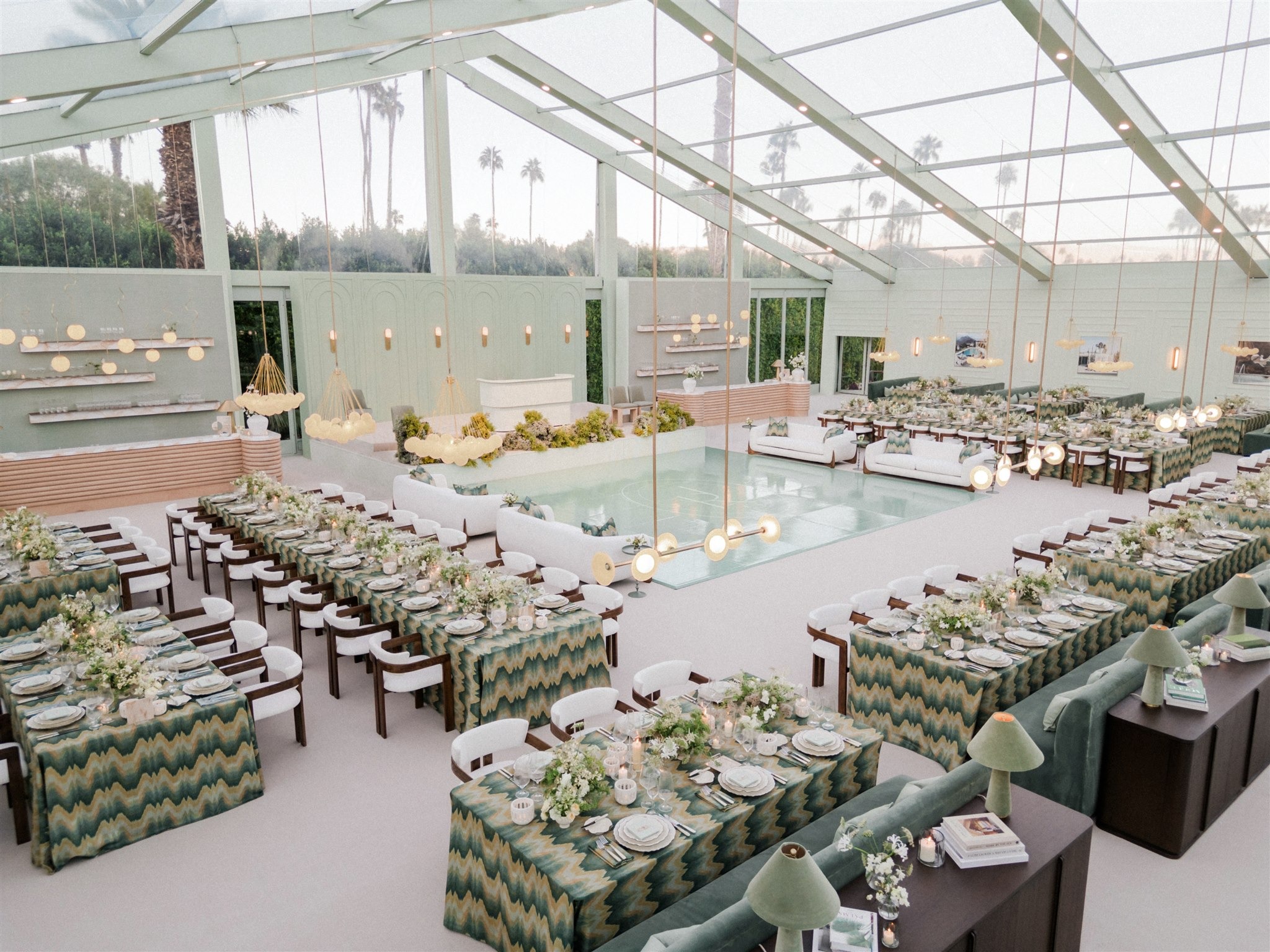 Aerial view of the reception tent with a pool-effect dance floor, Palm Springs, Revelry Event Designers