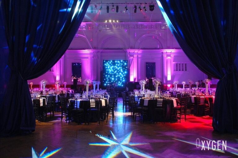 Lindley Hall set for a reception with draped backdrop, The Royal Horticultural Halls, Royal Horticultural Halls, lindley hall reception