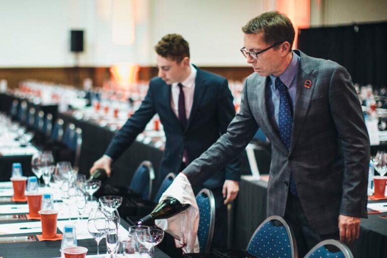 Glasses set for a banquet in Lindley Hall, The Royal Horticultural Halls, Royal Horticultural Halls, lindley hall wine service