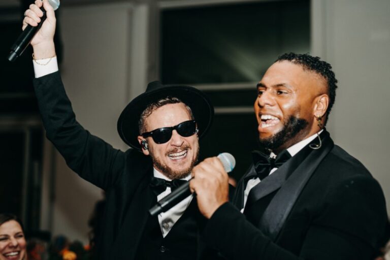 Two vocalists singing together at a wedding reception, Rinaldi Production