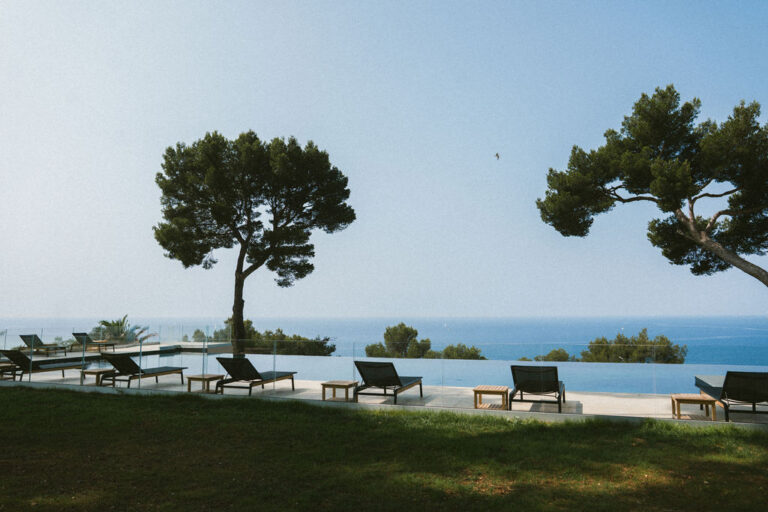 Infinity pool with loungers and sea views at La Corniche, Rocabella