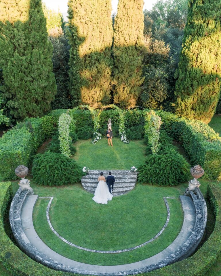 Sara and Tyler on the steps of the garden amphitheatre, seen from above, Torre di Pila, Rocco Daniele Photography