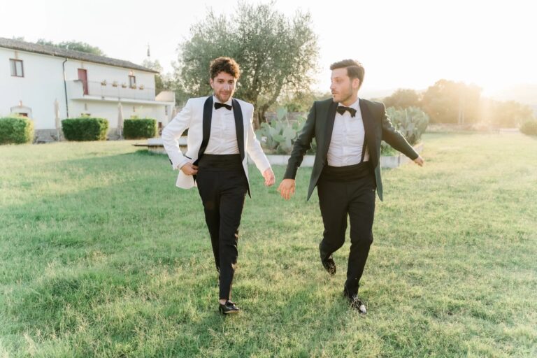 Luigi and Davide walking across the lawn at sunset, Castello di Serragiumenta, Calabria, Rocco Daniele Photography