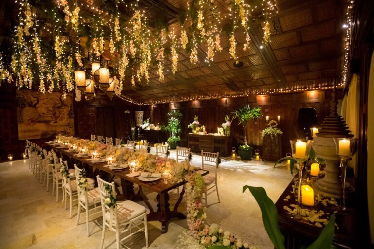 The banquet room lit with fairy lights and candles for a wedding dinner, Rocky’s Boutique Resort