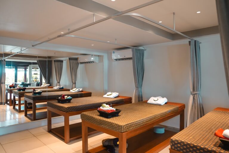 Spa treatment room with two massage beds, Rocky’s Boutique Resort