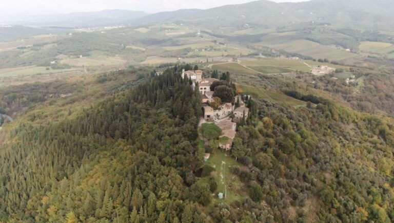 Aerial view of a hilltop estate above wooded hills and vineyards (Anna & Max), RoRas Destination Wedding