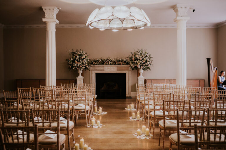 A ceremony laid out facing a fireplace, RSA House