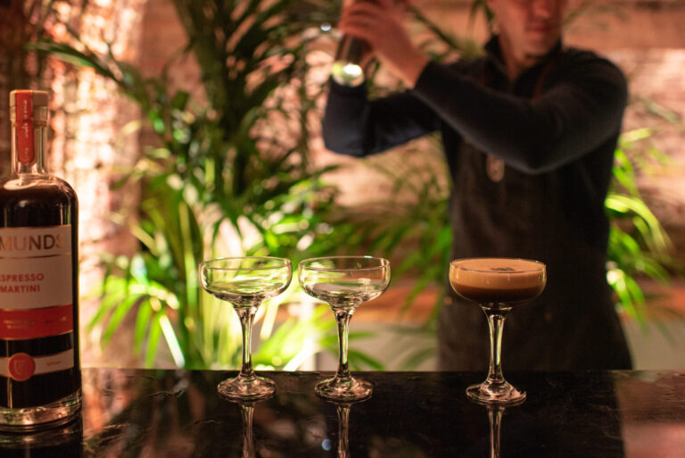 Cocktails being served at the bar, RSA House