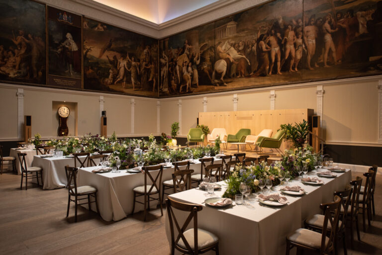 Long banquet tables in the Great Room, RSA House