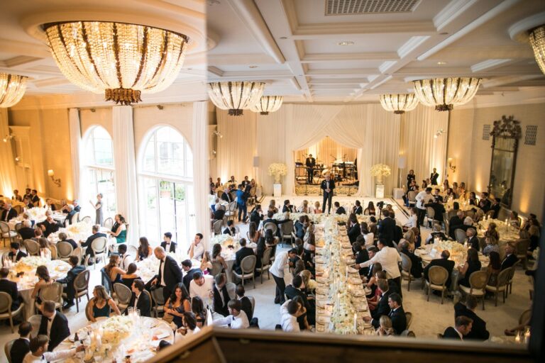 Wedding ceremony in a chandeliered ballroom seen from above, Samuel Lippke Studios