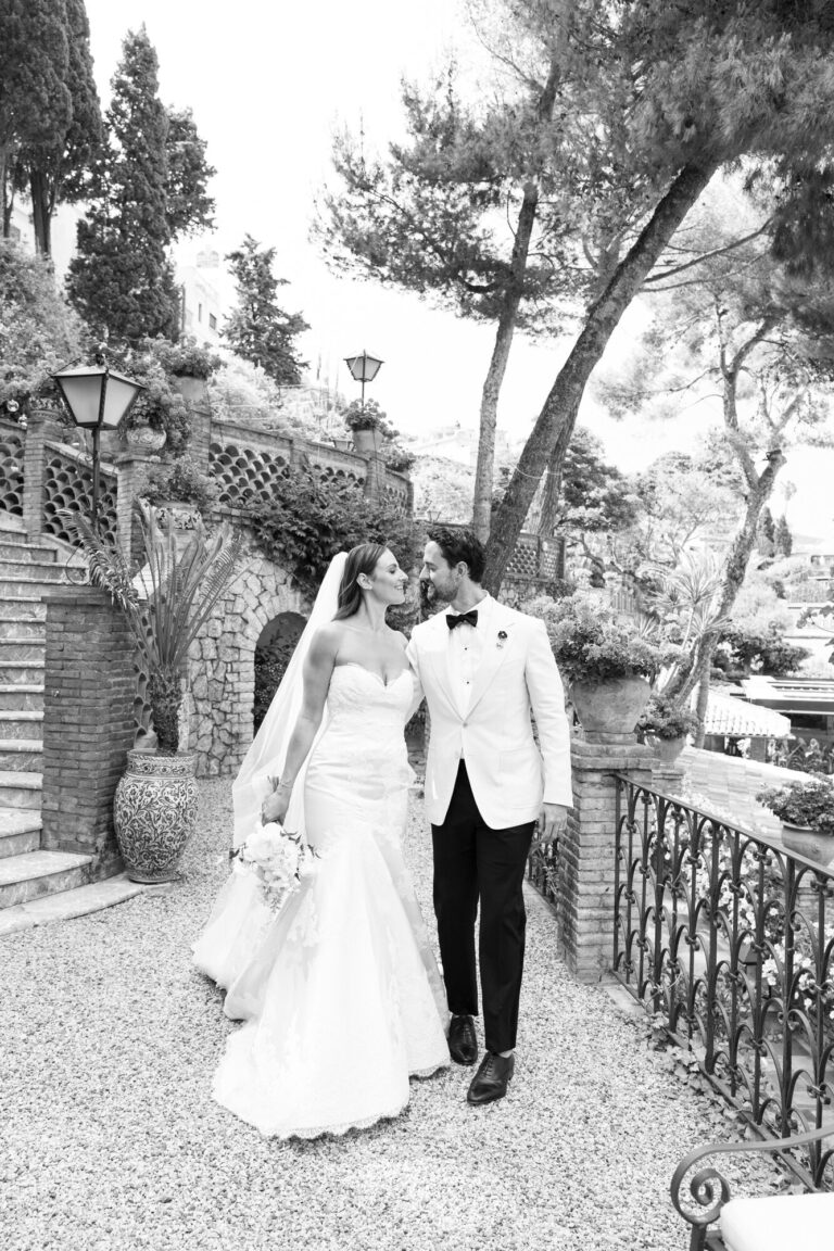 Couple walking down stone steps in a terraced garden, black and white, Samuel Lippke Studios