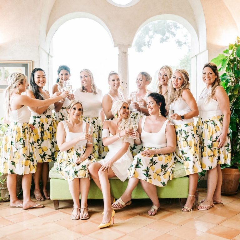 The bridal party toasting in lemon-print dresses, Sanda Pandza Events