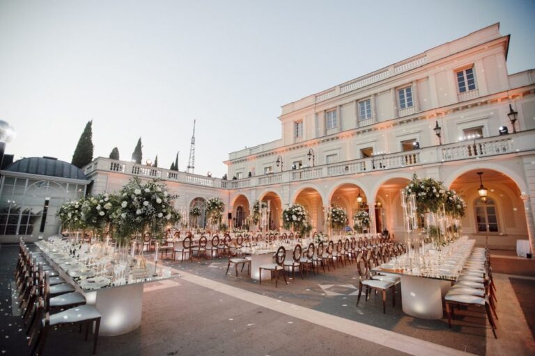A grand palazzo courtyard set for dinner at dusk, Sanda Pandza Events