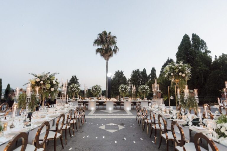 The palazzo courtyard reception beneath a palm tree, Sanda Pandza Events