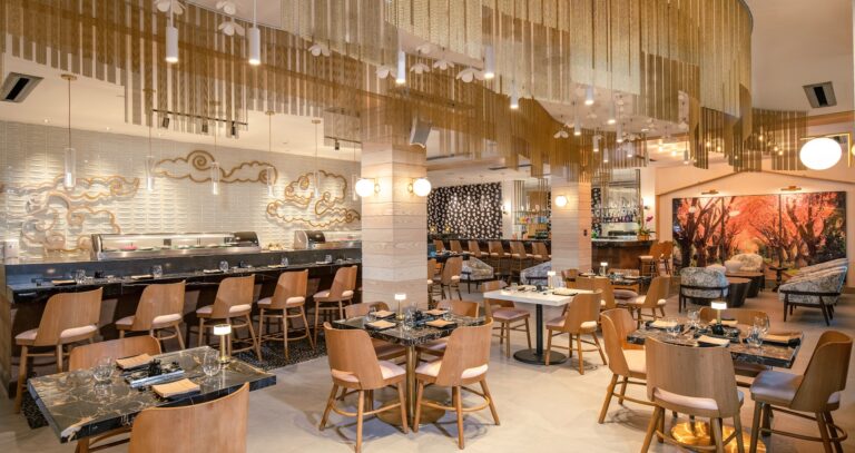 A sushi restaurant with a counter and tables, Sandals Dunn's River