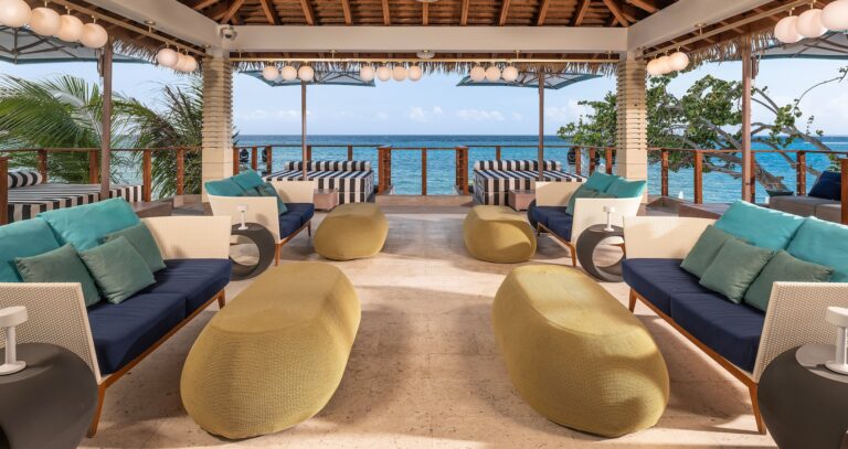 An open-air lounge pavilion above the sea, Sandals Dunn's River