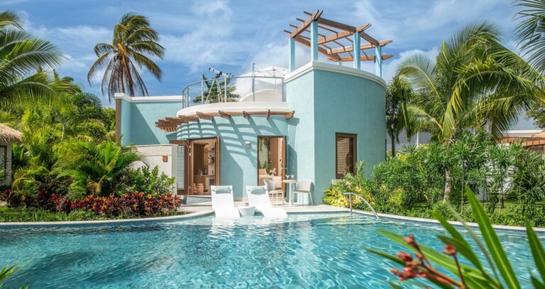 A rondoval-style villa with a rooftop terrace beside the pool, Sandals Dunn's River