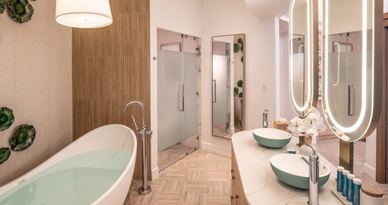 A suite bathroom with a freestanding tub and walk-in shower, Sandals Dunn's River