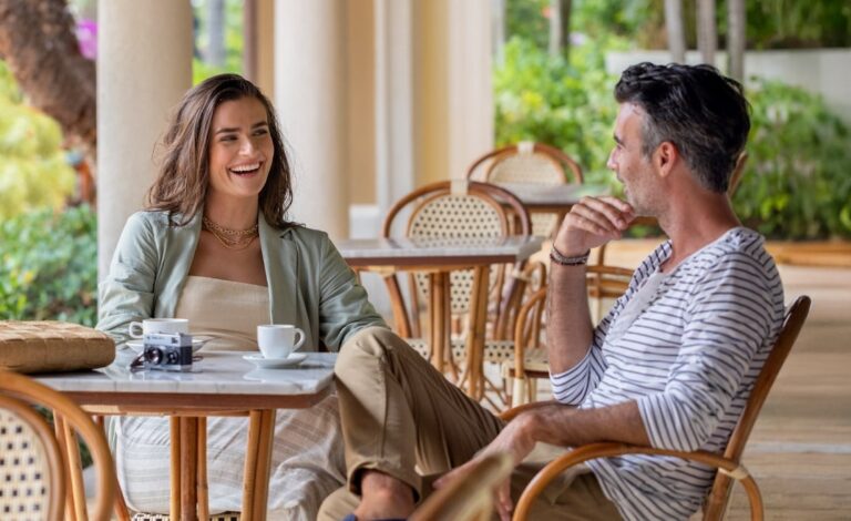 A couple dining al fresco, Sandals Royal Caribbean Resort and Private Island