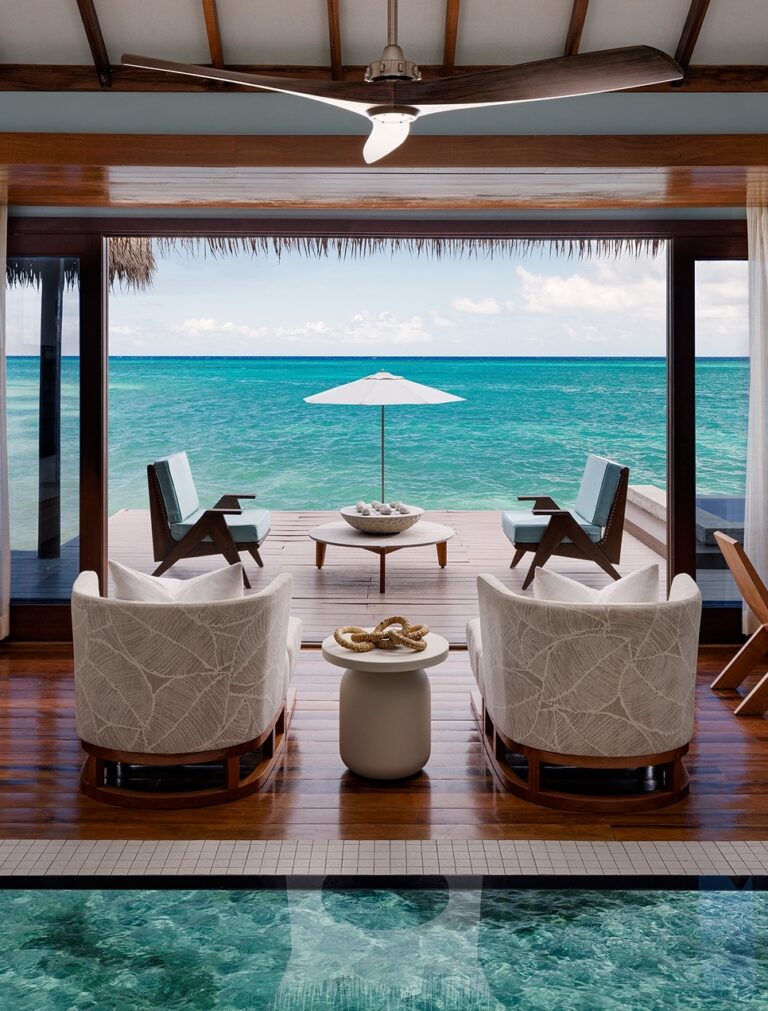 An overwater bungalow interior looking out to sea, Sandals Royal Caribbean Resort and Private Island