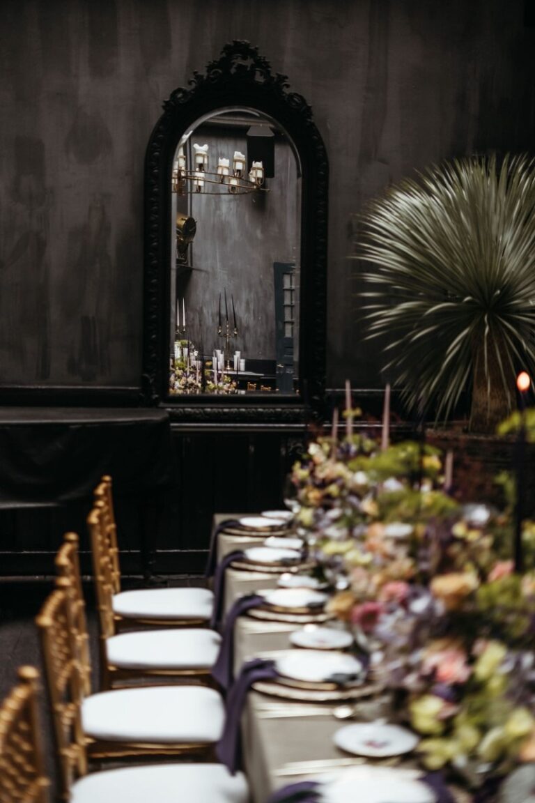 Long banquet table with dark linen and spring flowers, Wester-Amstel, Amstelveen, Sante Weddings