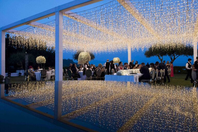 Dinner beneath a canopy of fairy lights on the terrace at Villa Cimbrone, Ravello, Sara D'Angelo