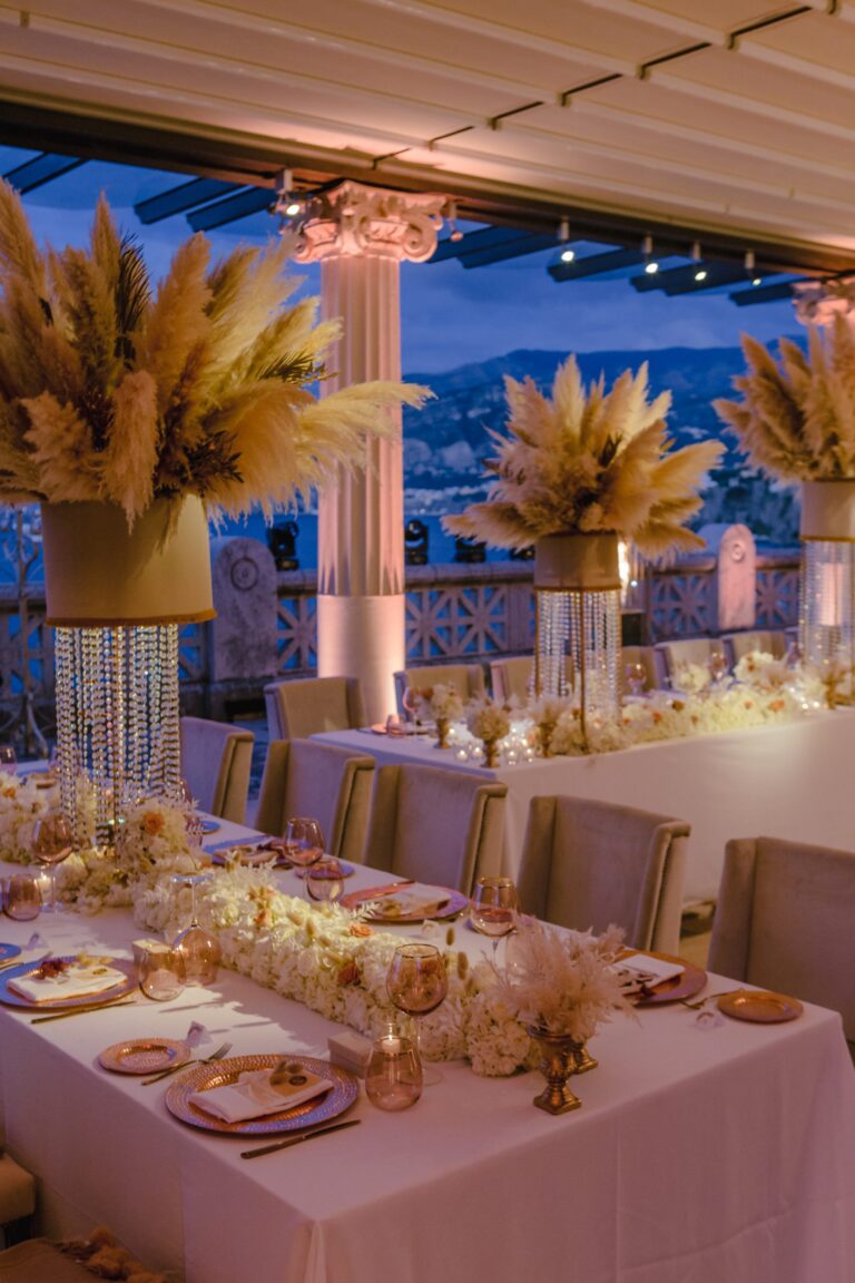 Table dressed with dried wheat and pampas arrangements at dusk, Bellevue Syrene, Sorrento, Sara D'Angelo