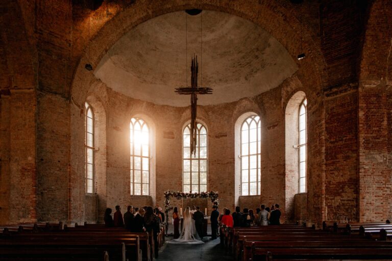 Brick church interior prepared for the ceremony, Sarah Linow
