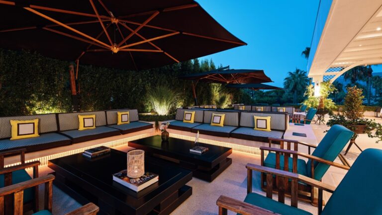 The rooftop terrace lounge at dusk, Savoy Hotel & Spa