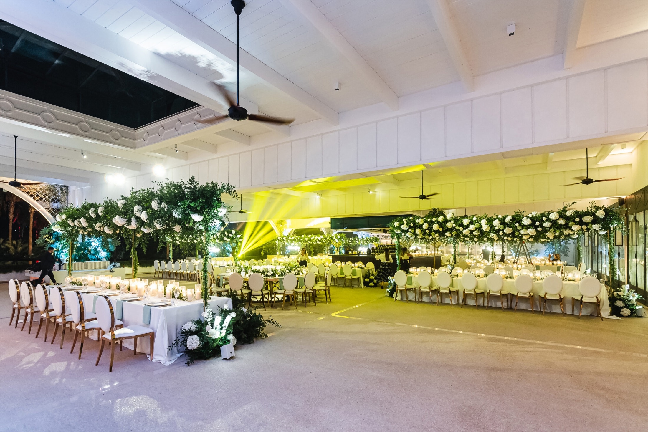 A reception salon dressed for a wedding dinner, Savoy Hotel & Spa