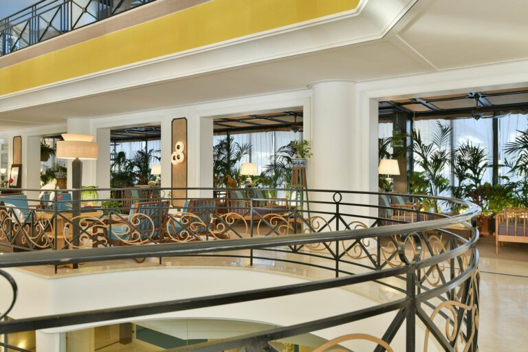 The palm-filled atrium of the hotel, Savoy Hotel & Spa