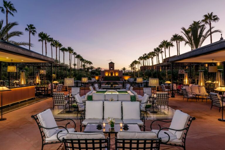 The pool terrace and bar at dusk, Selman Marrakech