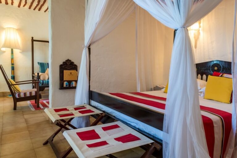 Four-poster bed in a Lamu Suite, Serena Beach Resort & Spa