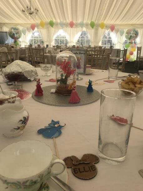 Marquee table with fairytale centrepieces and place names, Serendipity Street