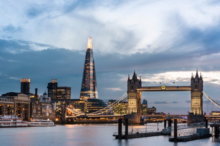 The Shard rising above the south bank at dusk, with Tower Bridge and the Thames in front, Shangri-La Hotel, The Shard, London