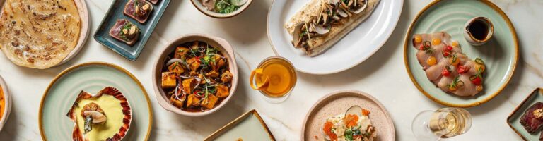 Dishes from TING, the hotel restaurant, spread across a marble table, Shangri-La Hotel, The Shard, London